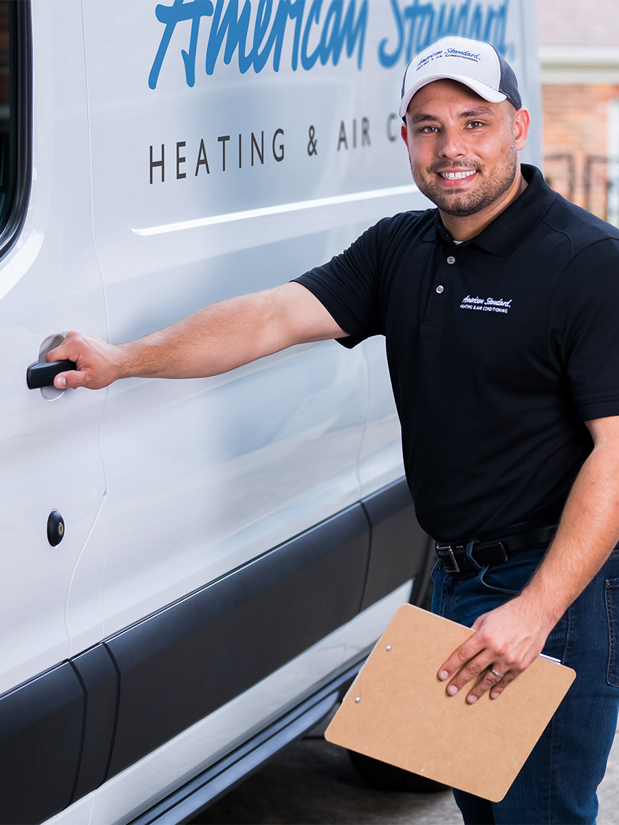 American Standard tech with their van